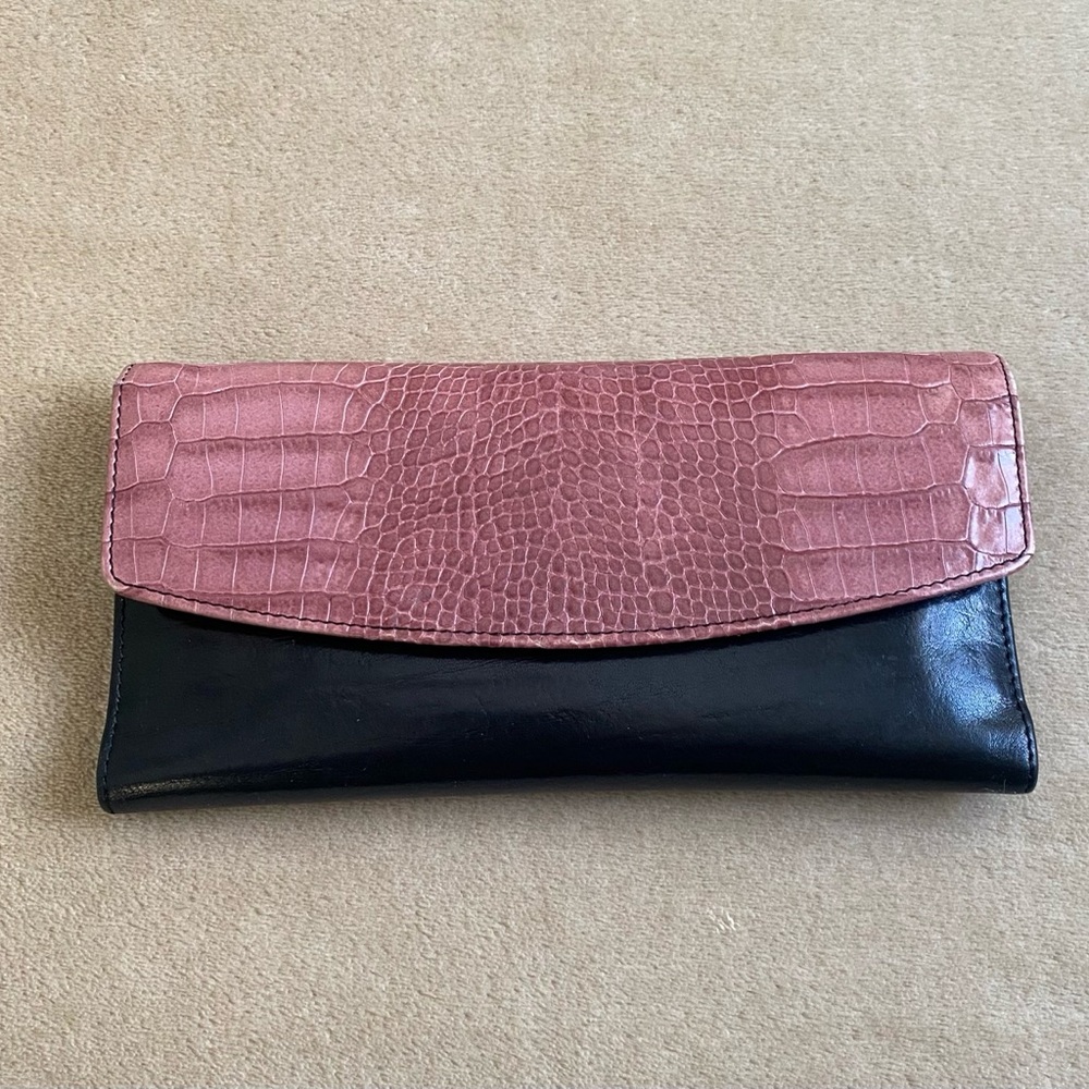 Brahmin tri-fold check book wallet. Black/mauve. GUC slight mark on the back.